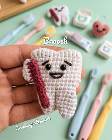 Tooth Brooch English-us