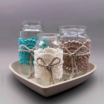 Crochet shabby style decoration from scraps of yarn for used glasses