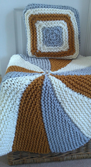 Chunky rug or floor cushion and small cushion