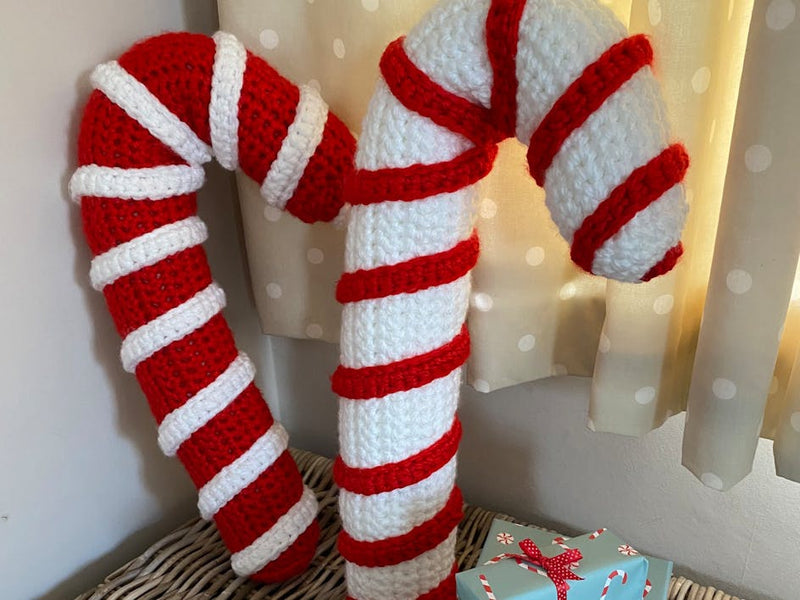 Learn how to crochet the sweetest giant candy cane!