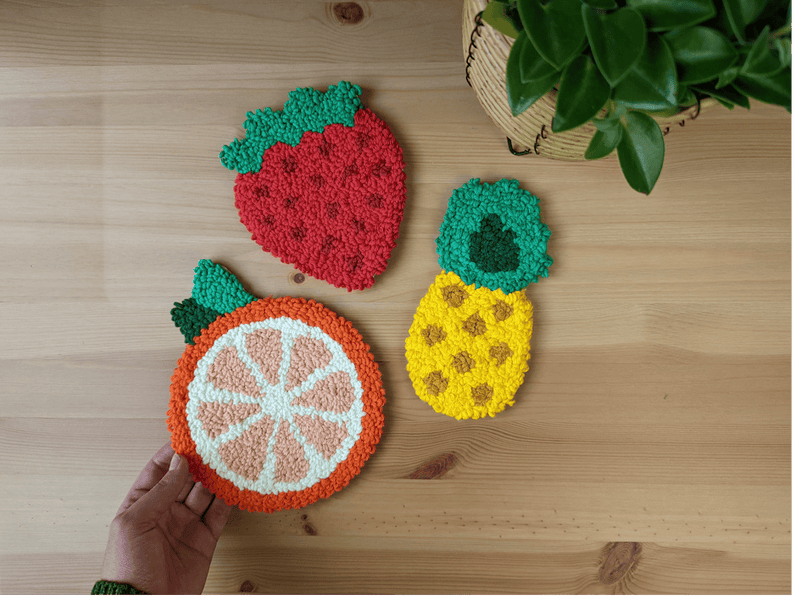 Learn how to make a fruity punch needle coaster trio