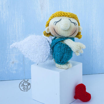 Small Cupid doll knitting flat