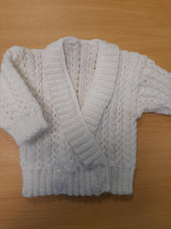 Cross-over baby cardigan