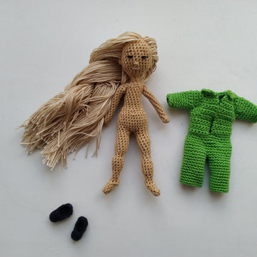 Tiny pose-able doll