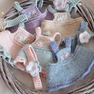 Knitting pattern for bunny and kitten outfit