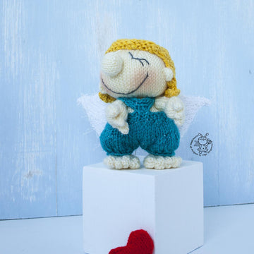 Small Cupid doll knitting flat