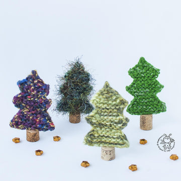 Many Christmas trees knitted flat