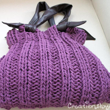 Cables and bobbles handbag