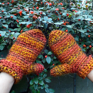 Mittens with a button