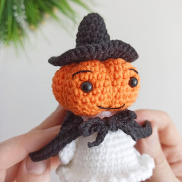 Halloween ghost with a pumpkin head