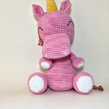 Cornelia the amigurumi pink unicorn