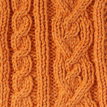 Cropped Cardigan with Deep Rib -  Knitting Pattern for Women in Debbie Bliss British Wool Aran by Debbie Bliss