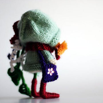 Floret. The Small Doll. She has a mouth with tongue. Wire in the legs
