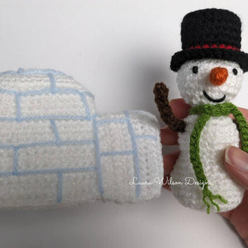 Simon the snowman and his igloo