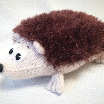 Original Knitting Patterns - knit hedgehog-pillow for children's room decor