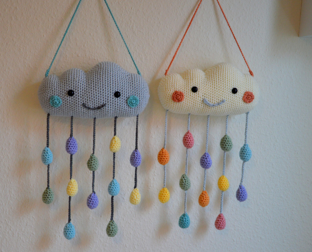 Cloud pillow and mobile with raindrops
