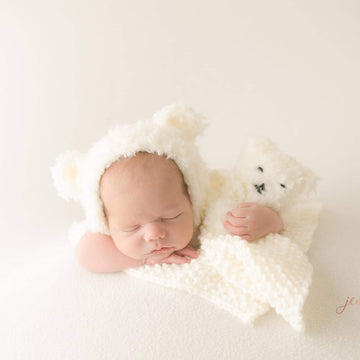 Tripp bonnet and sleeping teddy