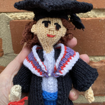 Graduation celebration doll