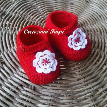 Red baby shoes with flower