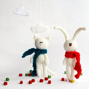 White rabbit in the red scarf and White cat in the dark green scarf