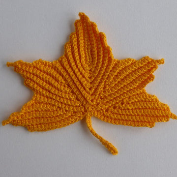 Maple leaf motifs. Irish crochet