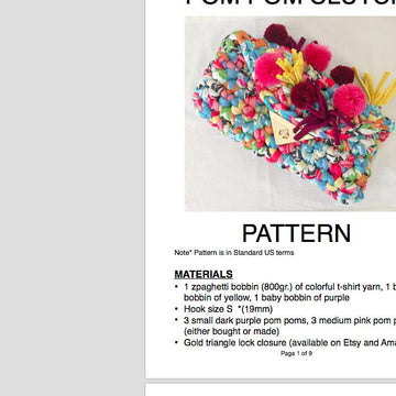 Pom Pom Clutch Bag