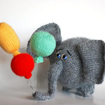 Airy-Fairy Flying elephant with 3 balloons ( knitted round )