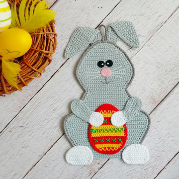 329 Rabbit with muffin basket egg bows