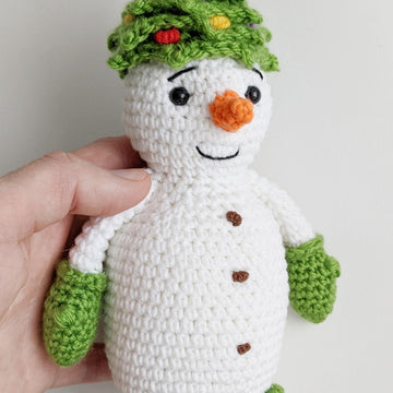 Crochet snowman in a Christmas tree hat amigurumi pattern