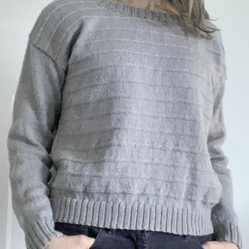 Linear sweater
