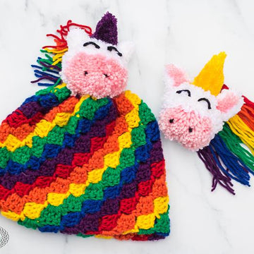 C2C Rainbow Hat with Unicorn Pom Pom