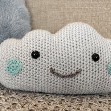 Cloud pillow and mobile with raindrops