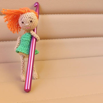 Tiny amigurumi doll