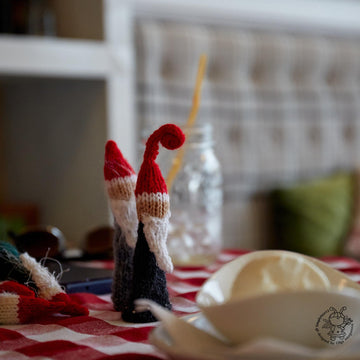 5 Santas  knitting flat