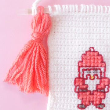 Christmas Fuzzy Sock Crochet Wall Hanging