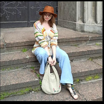 Model of a female cardigan for summer
