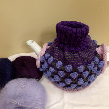 The colour Purple Tea Cosy
