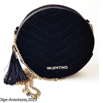 Evening bag round with Irish crochet lace