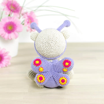 Teddy bear in a butterfly costume