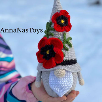 Gnome with poppy flower