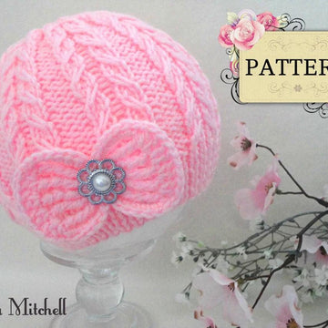 Knitted Baby Girl Hat with Crochet Bow by Elena Mitchell