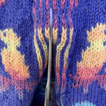 Coat with parrots