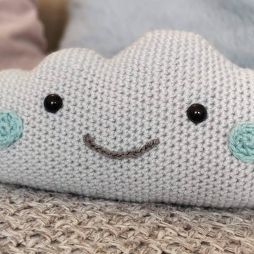 Cloud pillow and mobile with raindrops