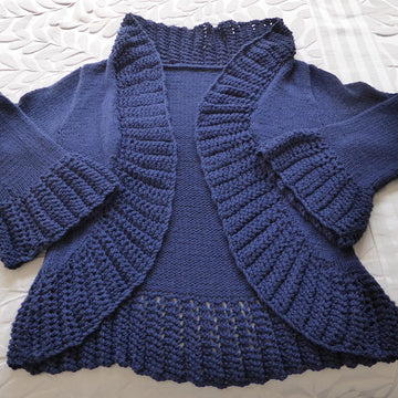 Jade - Lady’s 8ply jacket with lace edges
