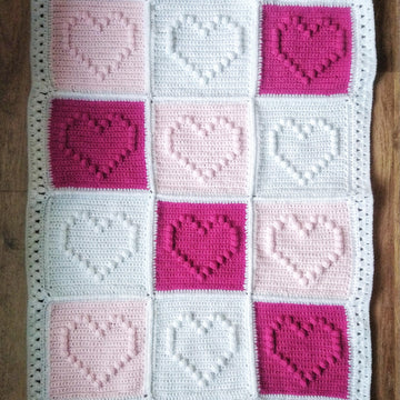 Crochet bobble heart baby blanket