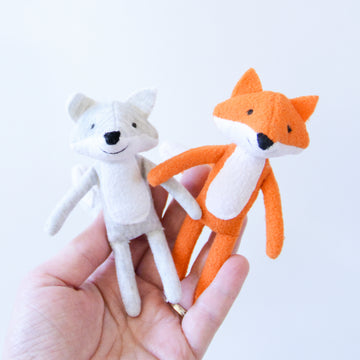 Stuffed miniature fox and wolf