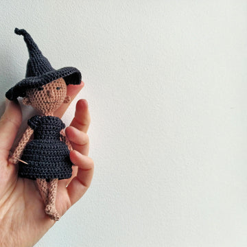 Witch the tiny doll