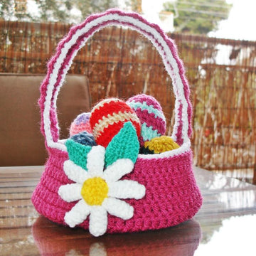 Easter flower basket and coloured easter eggs