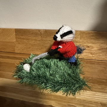 Mini Badger Playing Golf