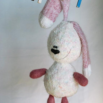 White rabbit with pink ears